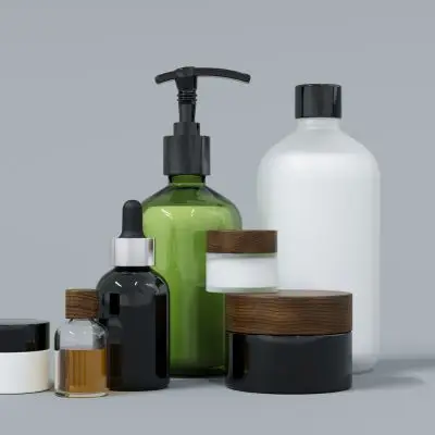 Green and white custom soap and lotion bottles for cosmetic packaging in Canada.